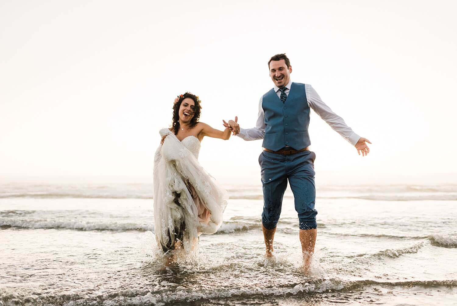 Arch Cape Oregon Coast elopement, running through water